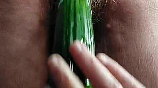Grandma fucks her hairy pussy with a cucumber 😈