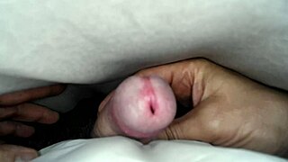 i'm rubbing my cock under the sheets until i cum hard